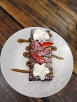 Chocolate Brownie with Caramel Sauce and Cream